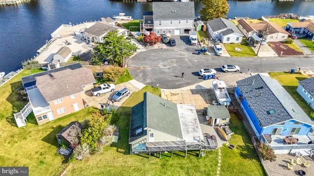 an aerial view of a house with a swimming pool