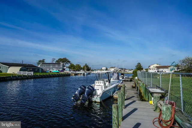 a view of a lake with sitting area