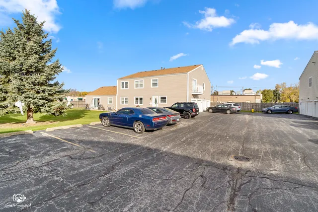 a view of car parked on the side of road