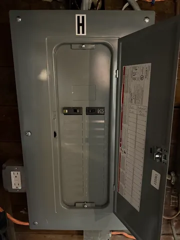 a bathroom with a glass door shower