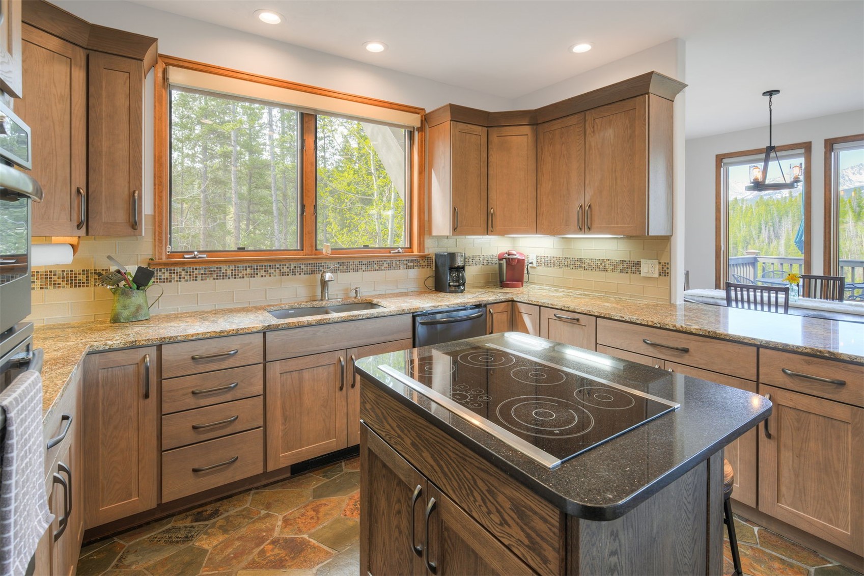 2542 Boreas Pass Road Breckenridge, CO 80424 - Photo 11 of 33 a kitchen that has a sink a window and a counter space