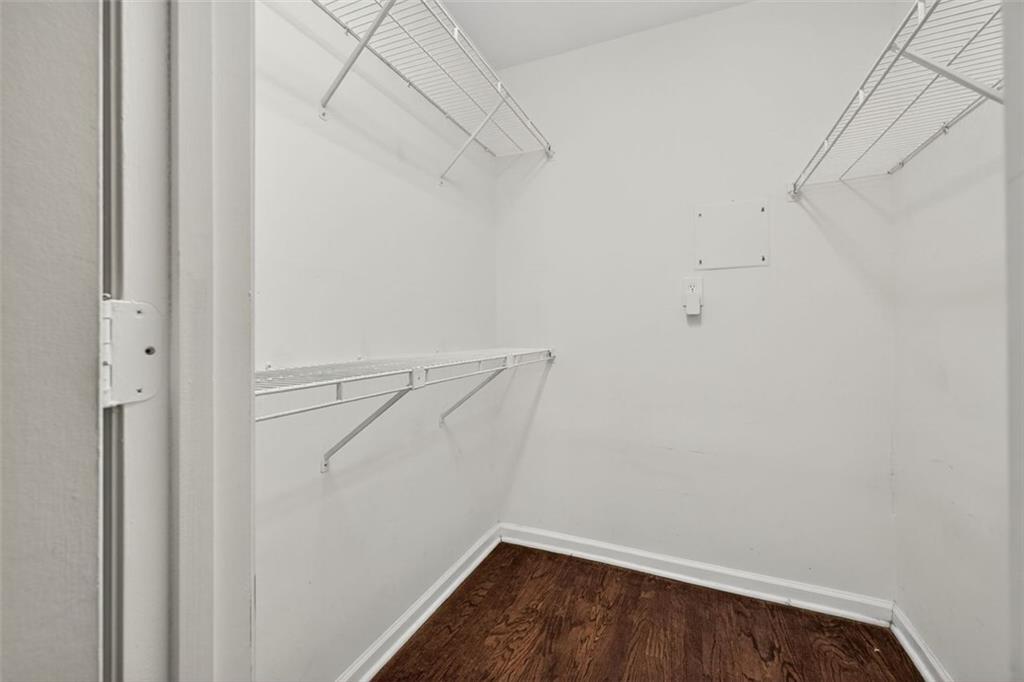 3063 Chastain Park Court Northeast Atlanta, GA 30342 - Photo 15 of 24 a view of a room with racks on the wall