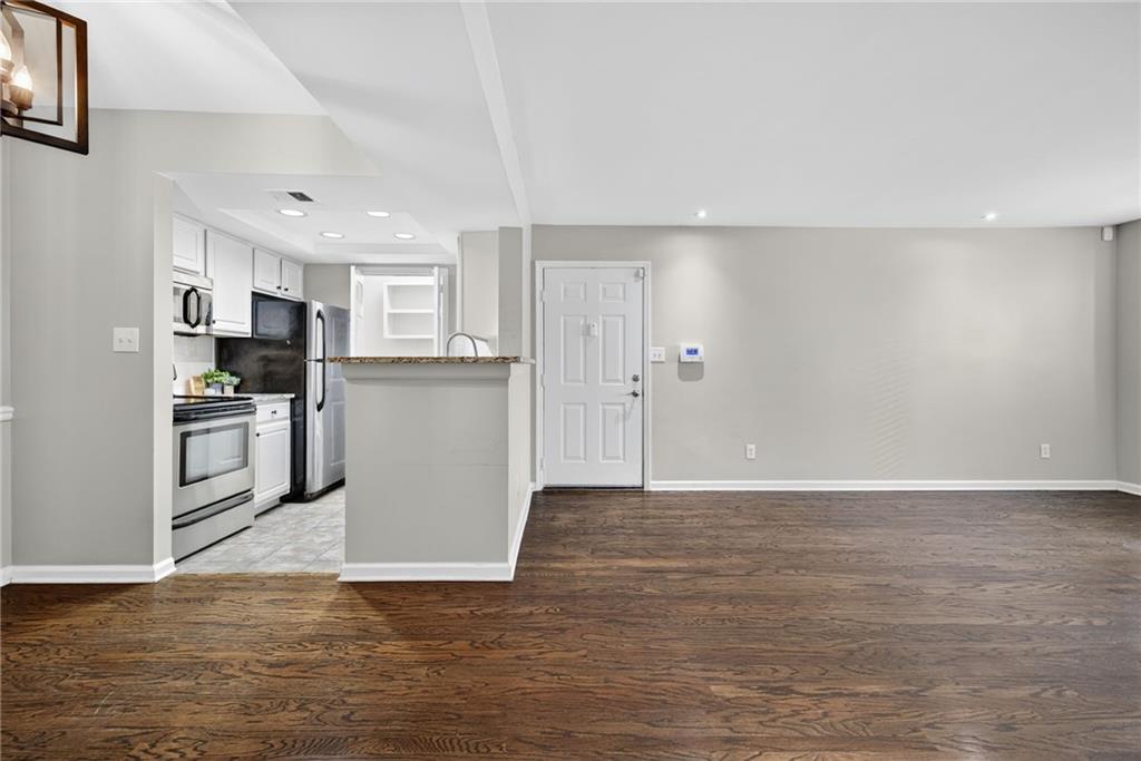 3063 Chastain Park Court Northeast Atlanta, GA 30342 - Photo 4 of 24 a view of kitchen with wooden floor
