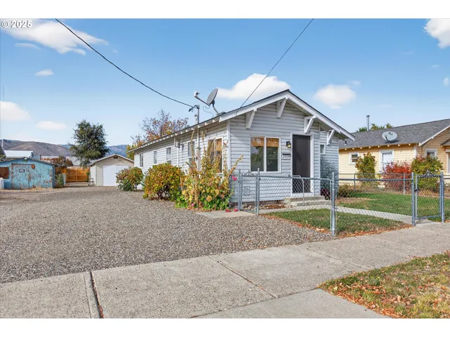 a house view with a garden space