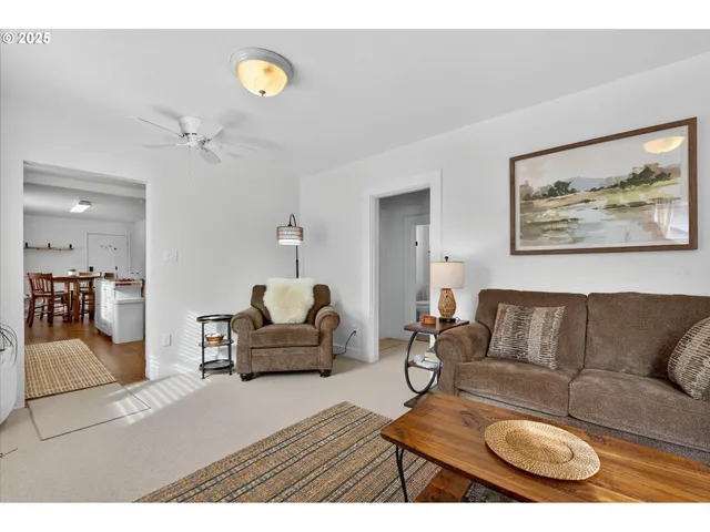 a living room with furniture and a couch
