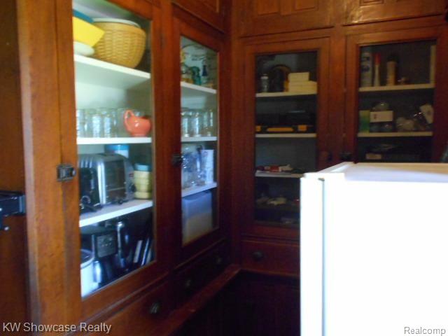 73827 Kanie Road Romeo, MI 48065 - Photo 8 of 51 Butlers pantry with original oak built in cabinets and dumb waiter