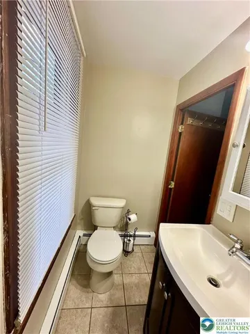 a bathroom with a sink and a toilet