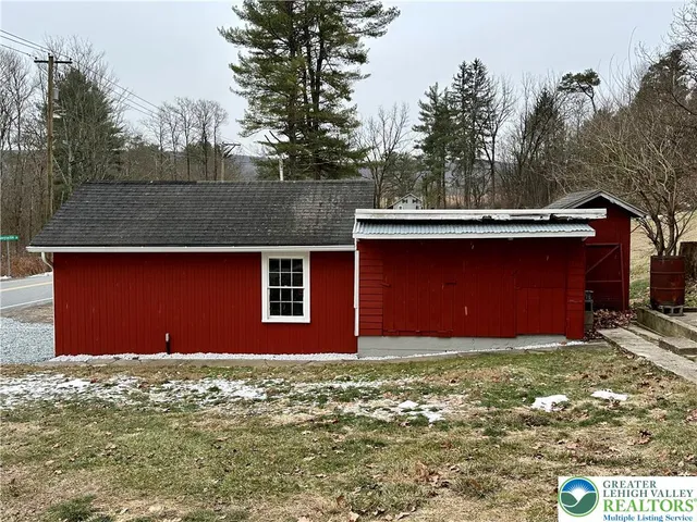 a front view of a house with yard