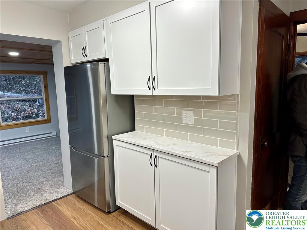 341 Berger Creek Road Lehighton, PA 18235 - Photo 5 of 17 a kitchen with cabinets and stainless steel appliances