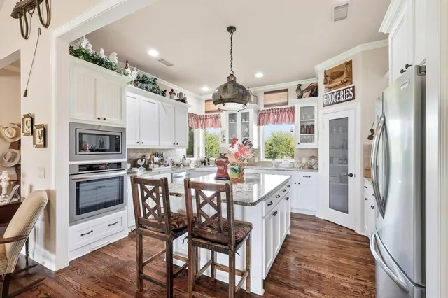 a living room with furniture fireplace and a flat screen tv