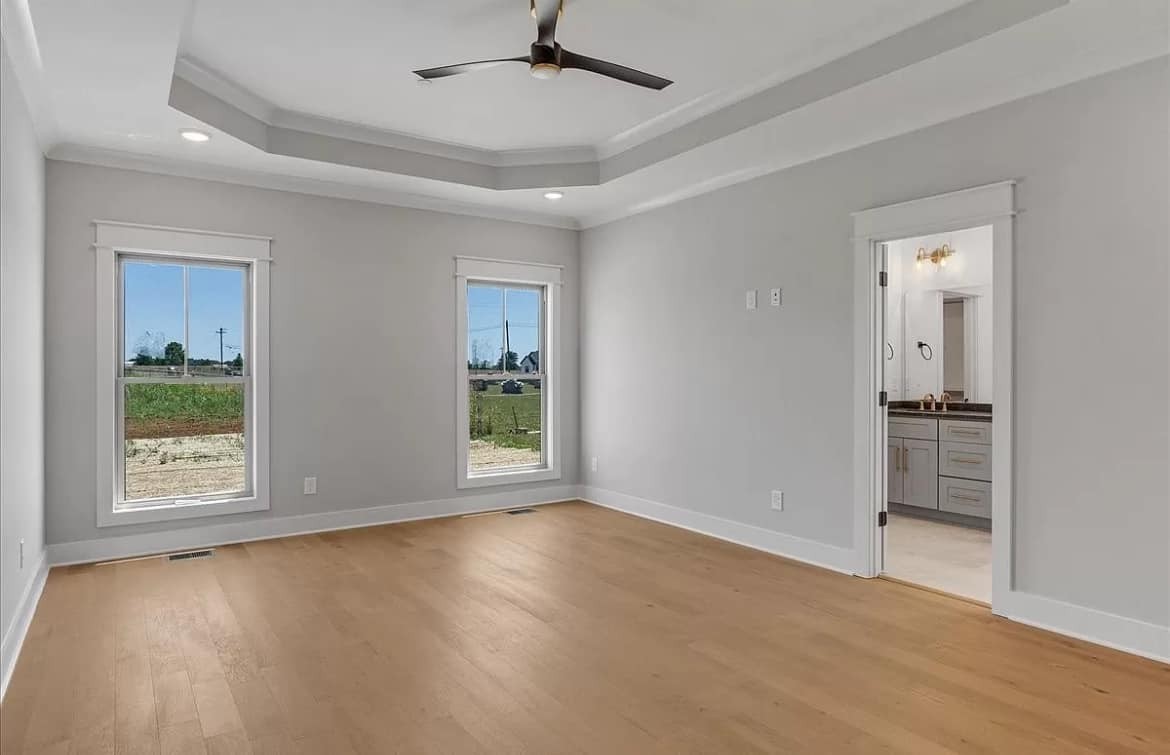 3023 Barretts Ridge Drive Murfreesboro, TN 37130 - Photo 15 of 33 a view of an empty room with a window and wooden floor