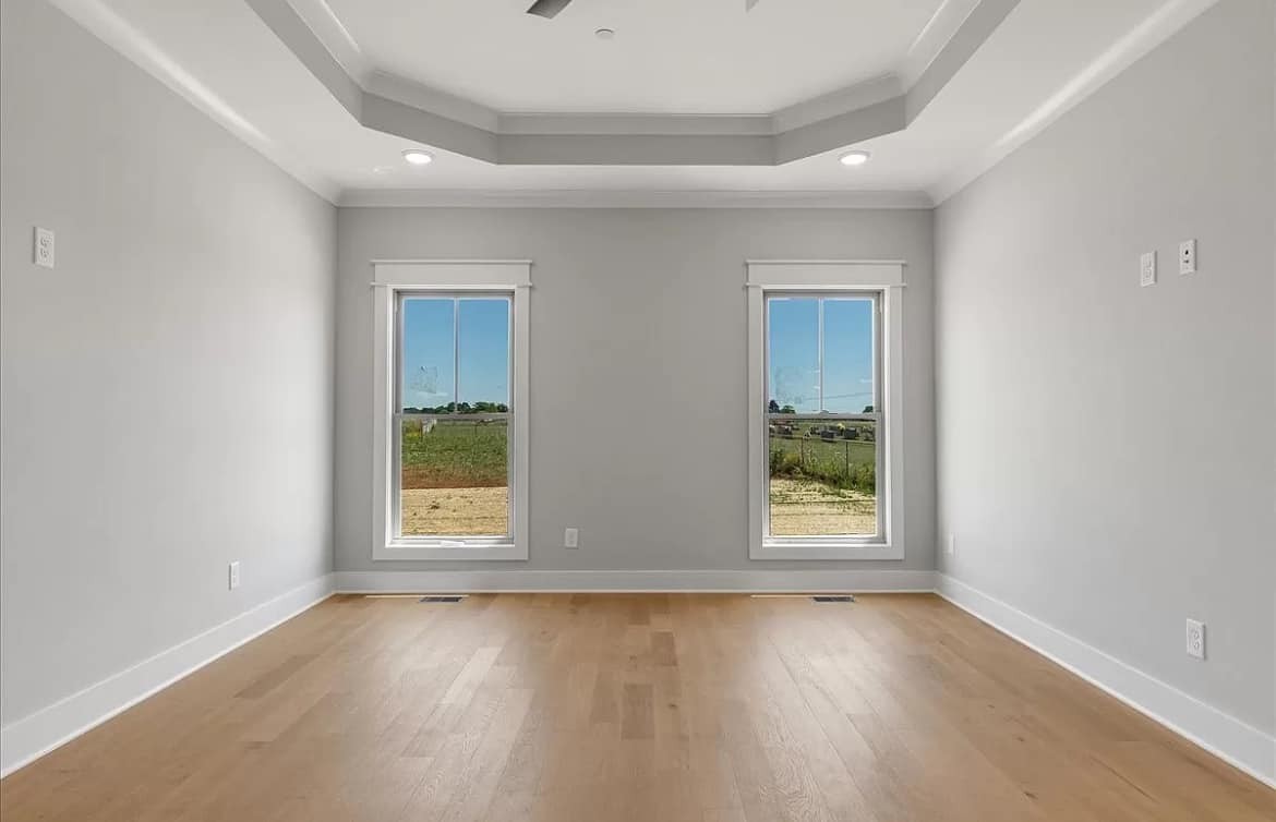 3023 Barretts Ridge Drive Murfreesboro, TN 37130 - Photo 16 of 33 an empty room with wooden floor and windows