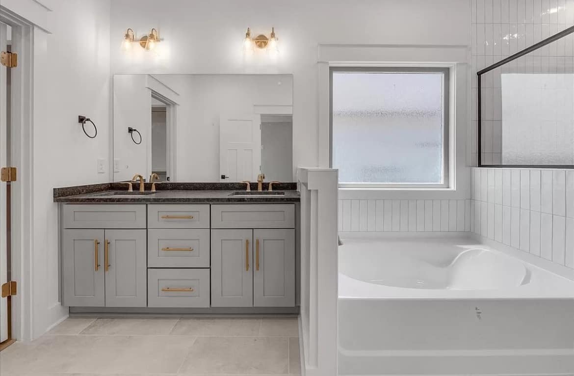 3023 Barretts Ridge Drive Murfreesboro, TN 37130 - Photo 17 of 33 a bathroom with a bathtub sink and mirror