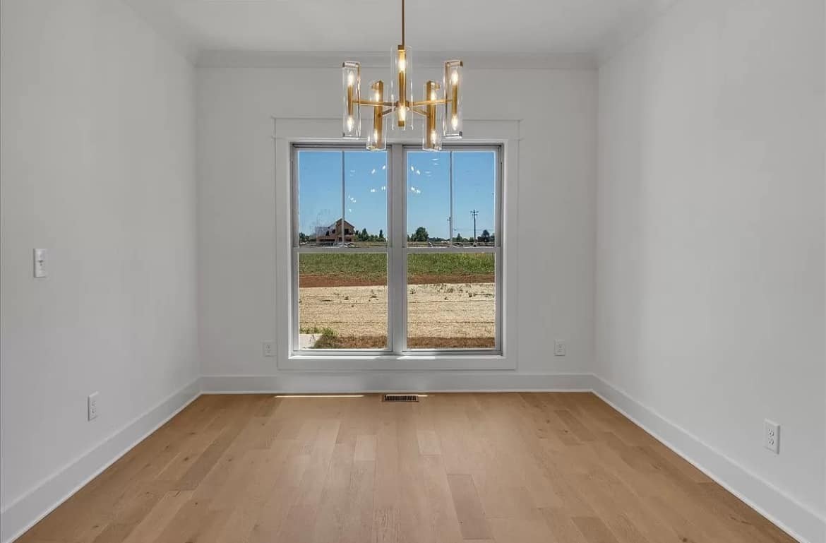 3023 Barretts Ridge Drive Murfreesboro, TN 37130 - Photo 26 of 33 an empty room with a windows and chandelier