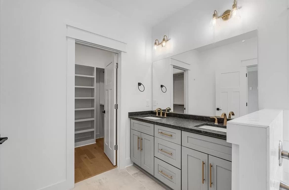 3023 Barretts Ridge Drive Murfreesboro, TN 37130 - Photo 27 of 33 a en suite bathroom with a granite countertop sink and a mirror