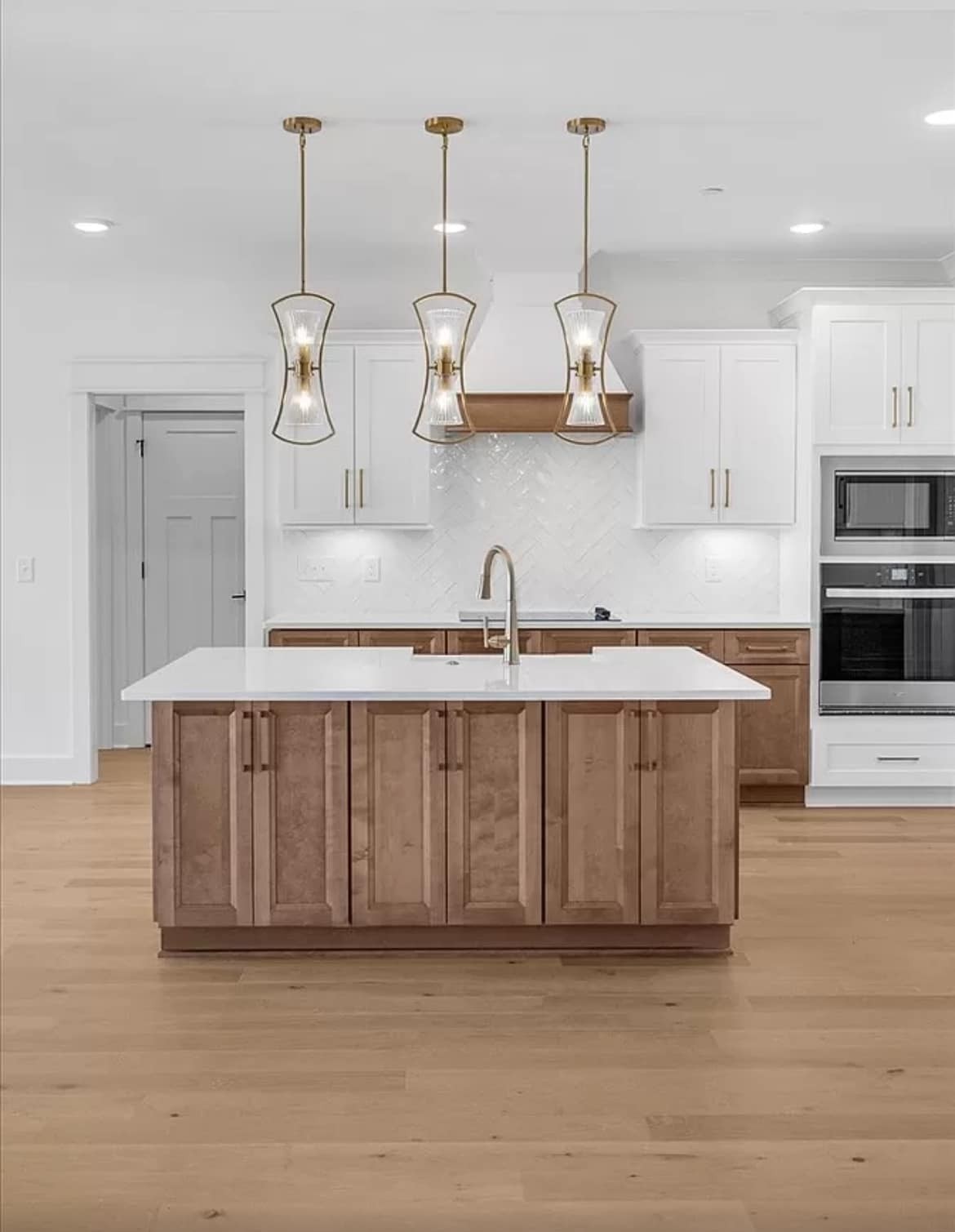 3023 Barretts Ridge Drive Murfreesboro, TN 37130 - Photo 7 of 33 a kitchen with stainless steel appliances granite countertop a sink a stove and a wooden floors