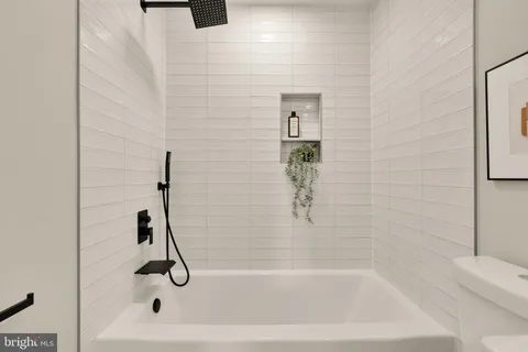 a bathroom with a bath tub