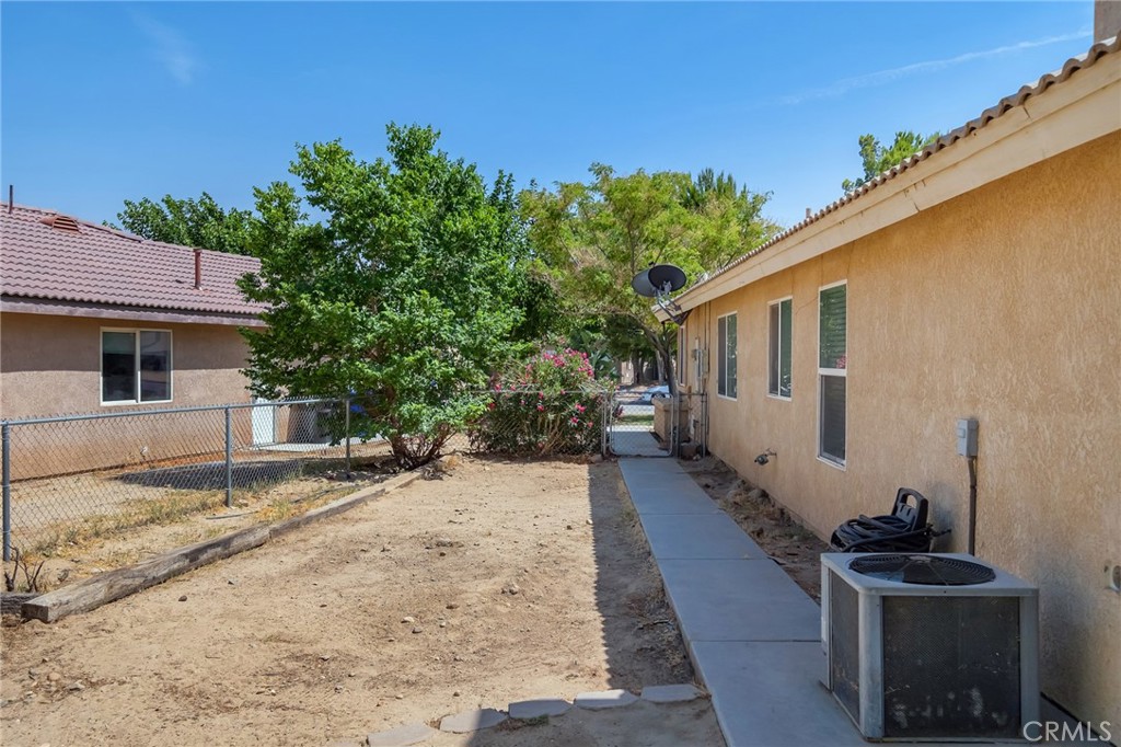 14952 Rivers Edge Road Helendale, CA 92342 - Photo 31 of 33 a view of a house with backyard
