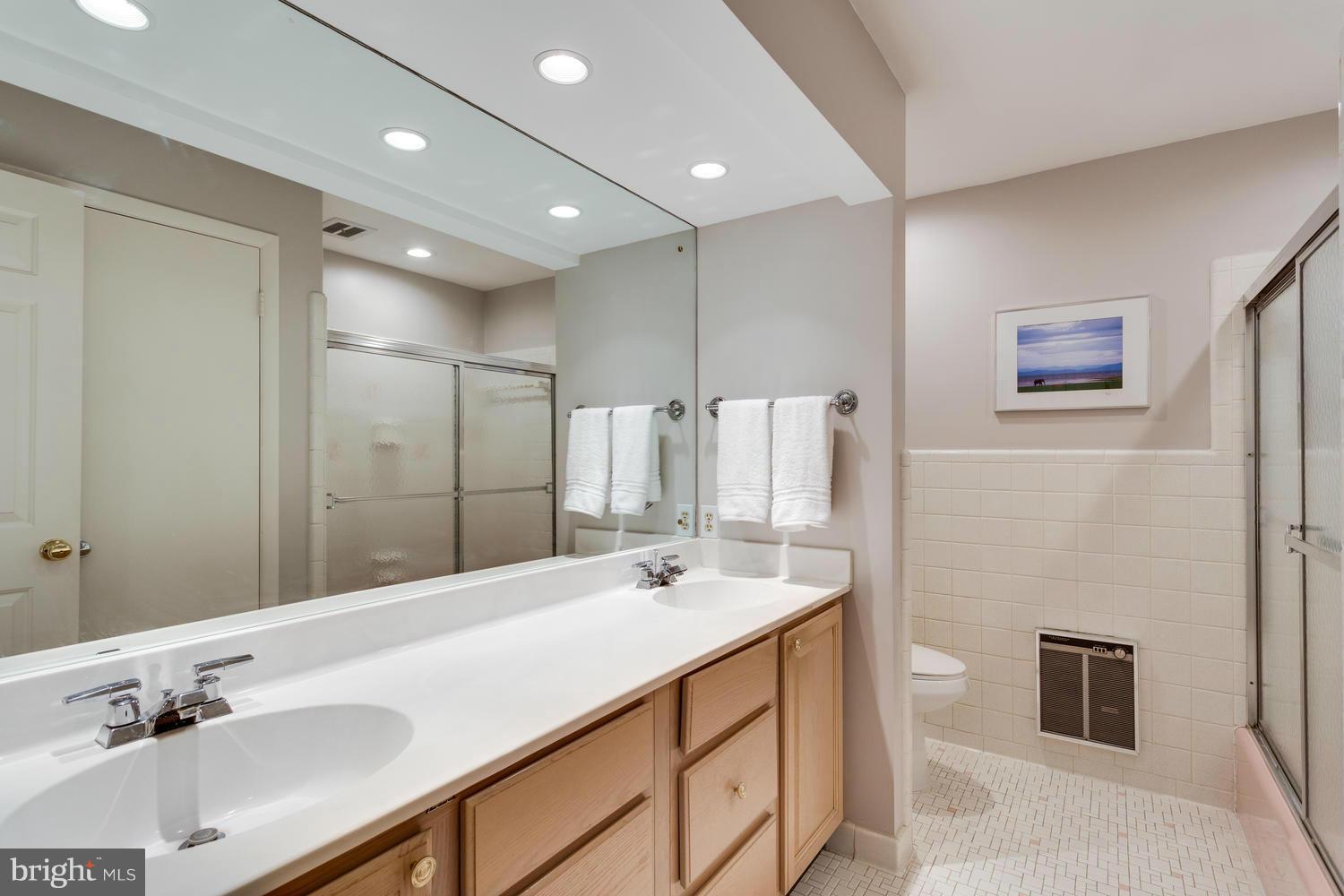 343 Springvale Road Great Falls, VA 22066 - Photo 21 of 26 Large Hall Bath with Dual Sinks