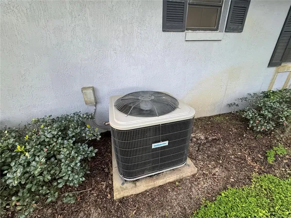 a stove top oven sitting inside of a kitchen