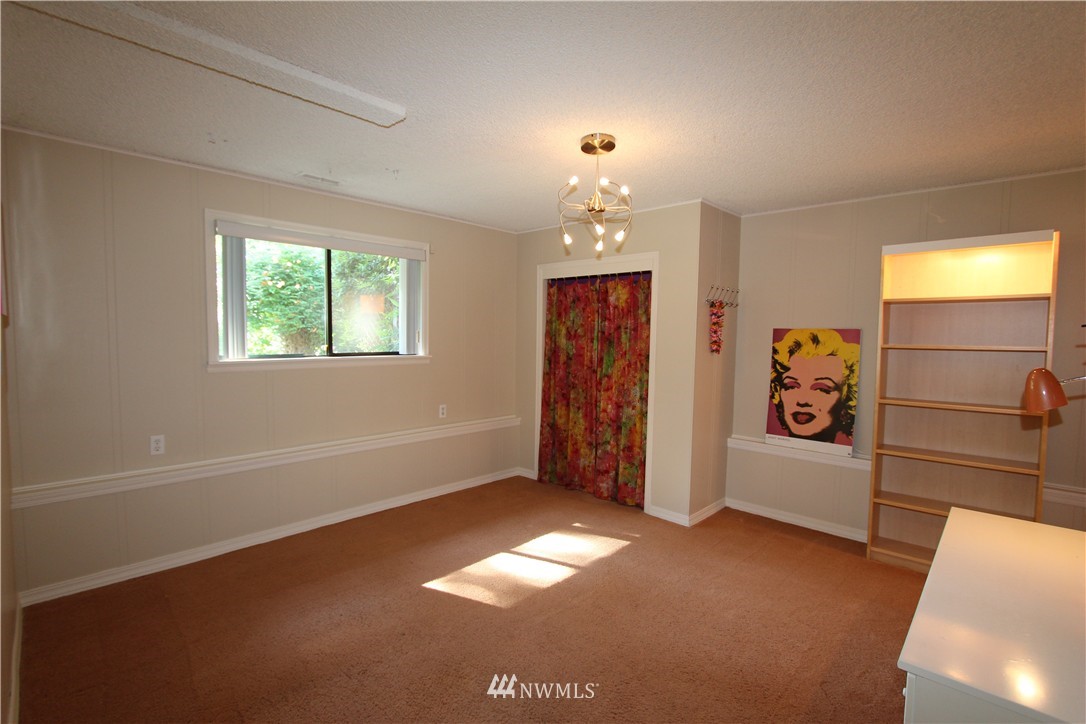 320 170th Place Southwest Bothell, WA 98012 - Photo 16 of 25 an empty room with windows
