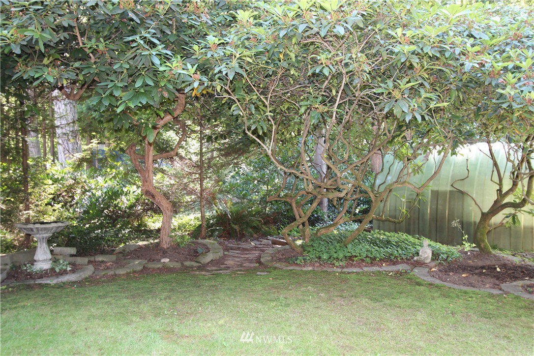 320 170th Place Southwest Bothell, WA 98012 - Photo 25 of 25 a view of a backyard with large trees