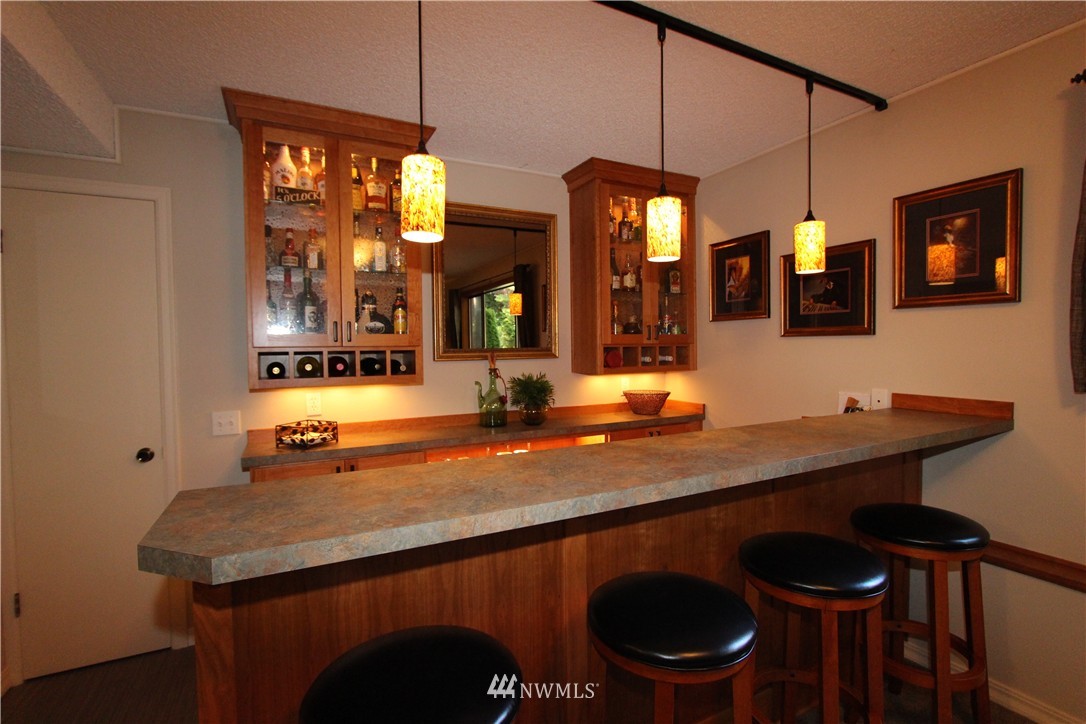 320 170th Place Southwest Bothell, WA 98012 - Photo 8 of 25 a kitchen with a table and chairs in it