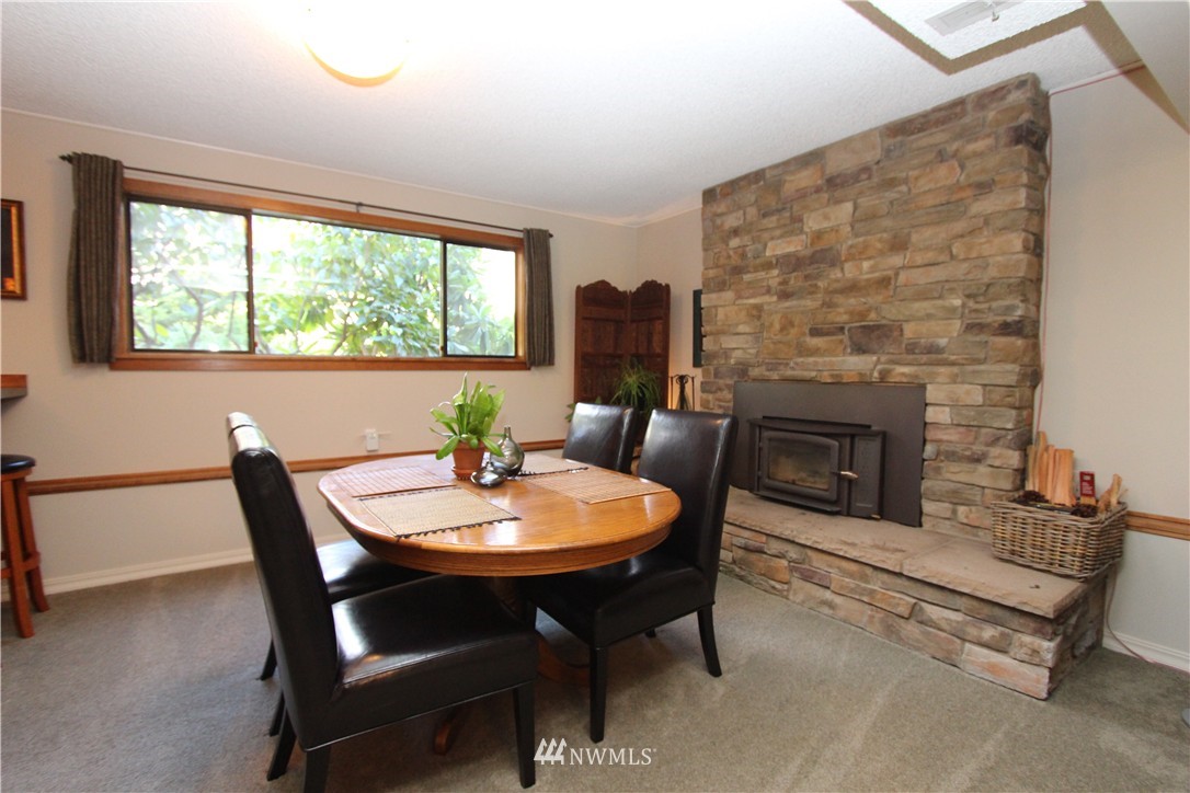 320 170th Place Southwest Bothell, WA 98012 - Photo 9 of 25 a view of a dining room with furniture window and outside view