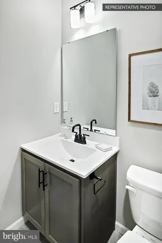 a bathroom with a sink and a toilet