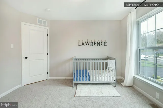 a view of a room with an entryway