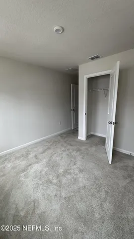 an empty room with a natural light