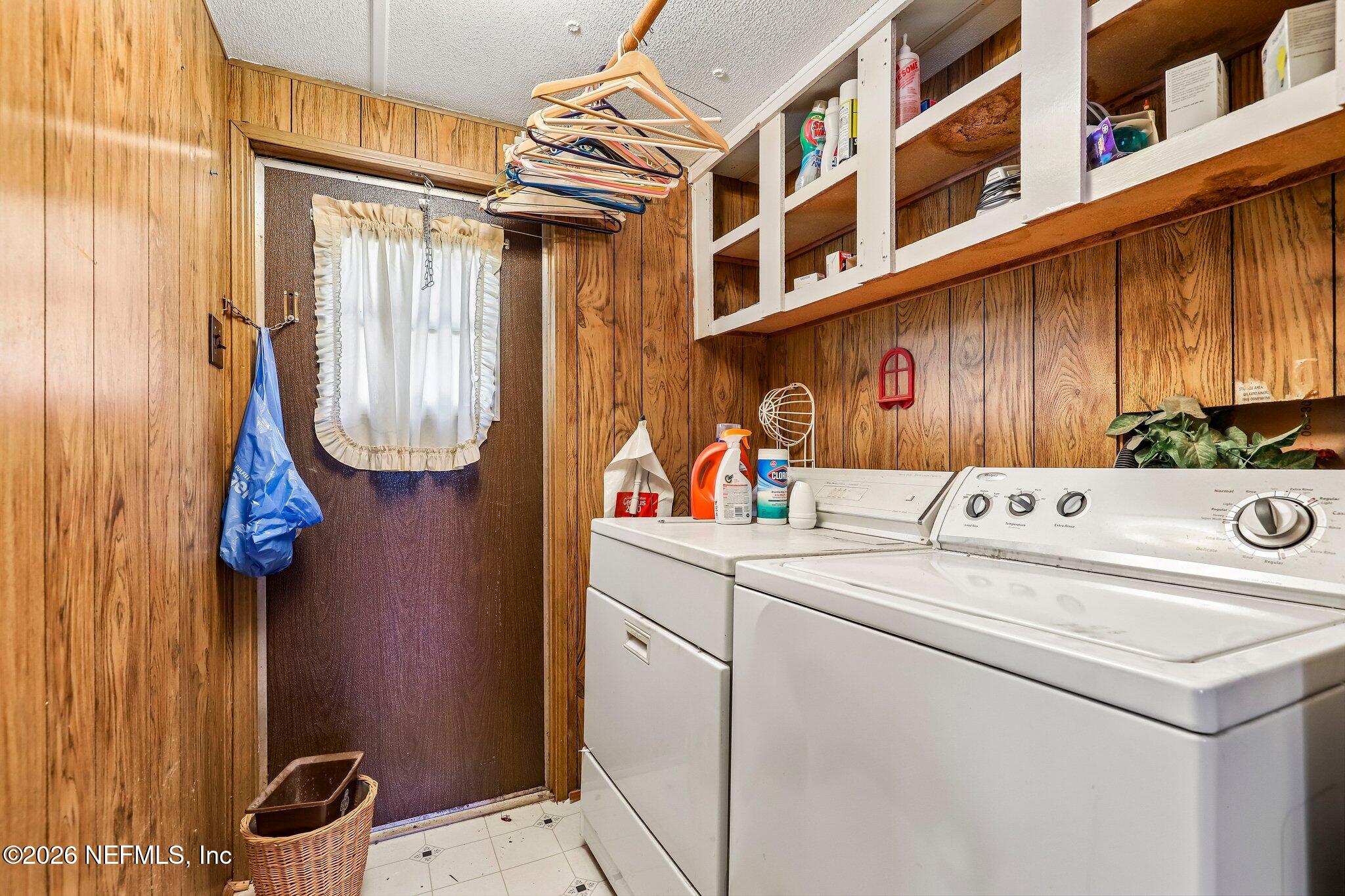9690 Black Jack Road Macclenny, FL 32063 - Photo 19 of 34 a utility room with dryer and washer