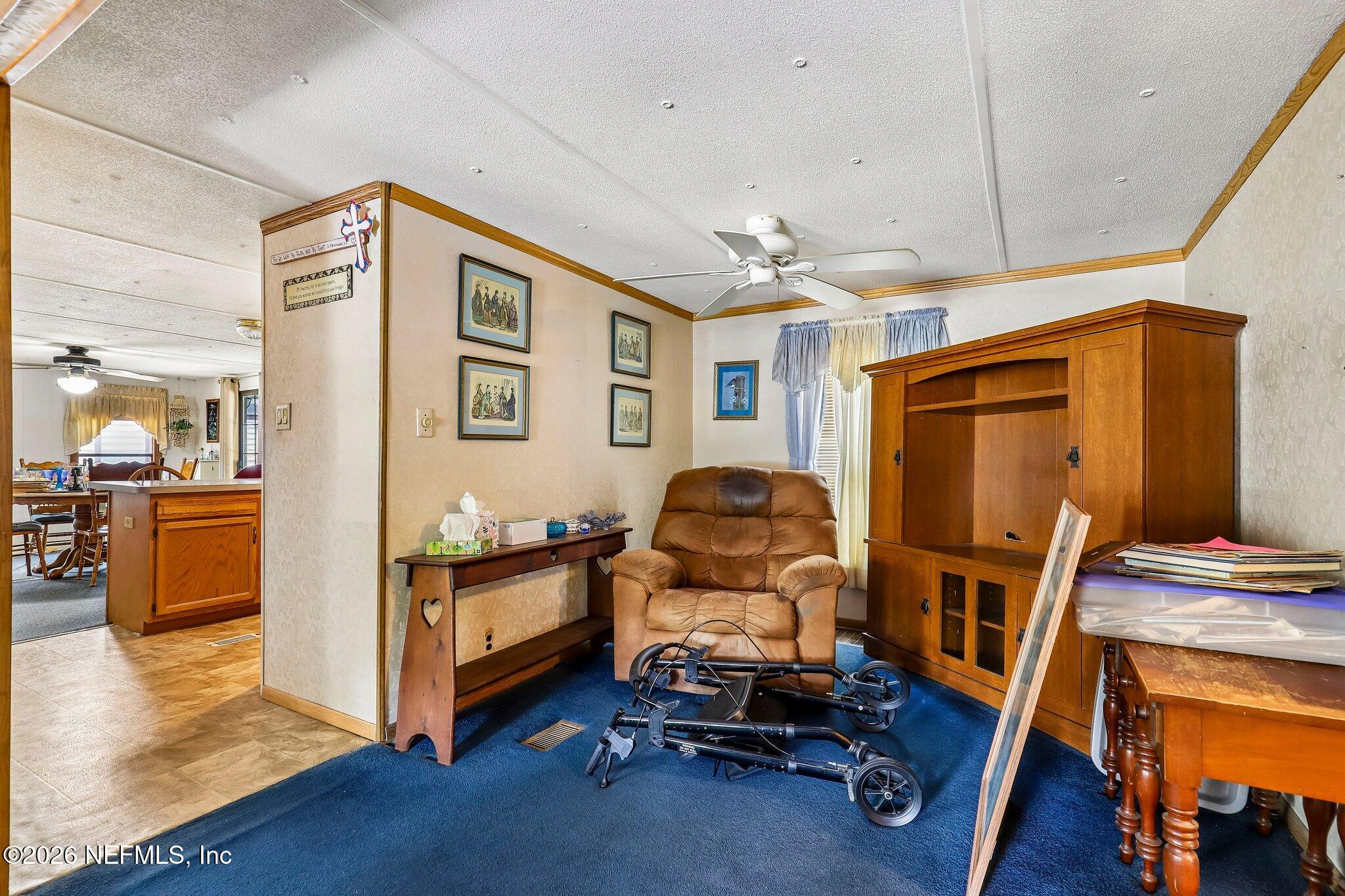 9690 Black Jack Road Macclenny, FL 32063 - Photo 25 of 34 a bedroom with furniture and a window