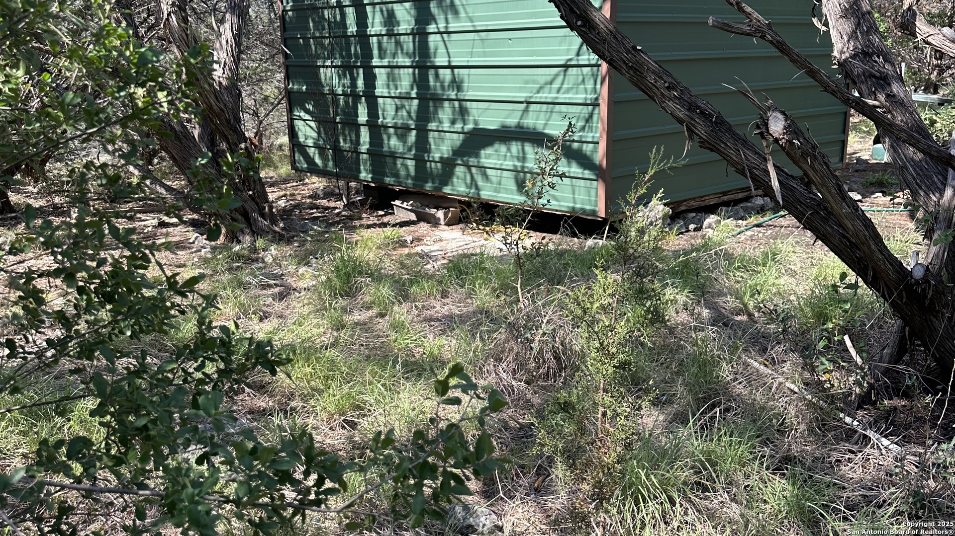 121 Agarita Drive Spring Branch, TX 78070 - Photo 9 of 23 a view of a backyard