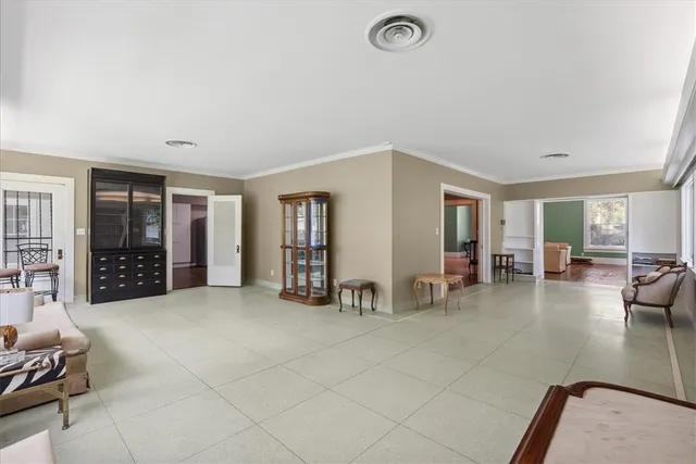 a view of livingroom with furniture and windows