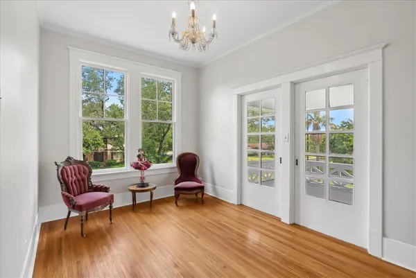 a living room with furniture and a window