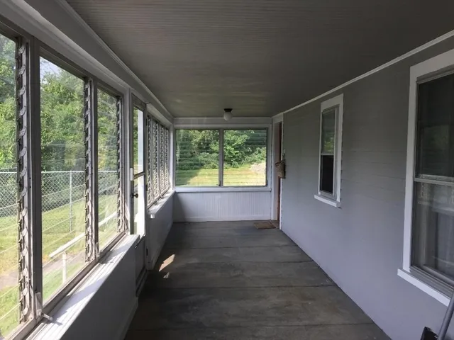 a view of hallway with stairs