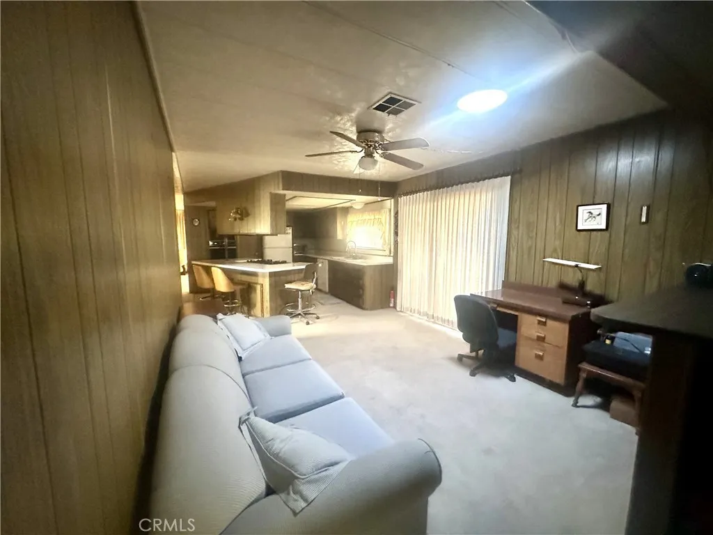 11250 Beach Stanton Ca, Unit 31 Stanton, CA 90680 - Photo 15 of 15 a living room with furniture and a large window