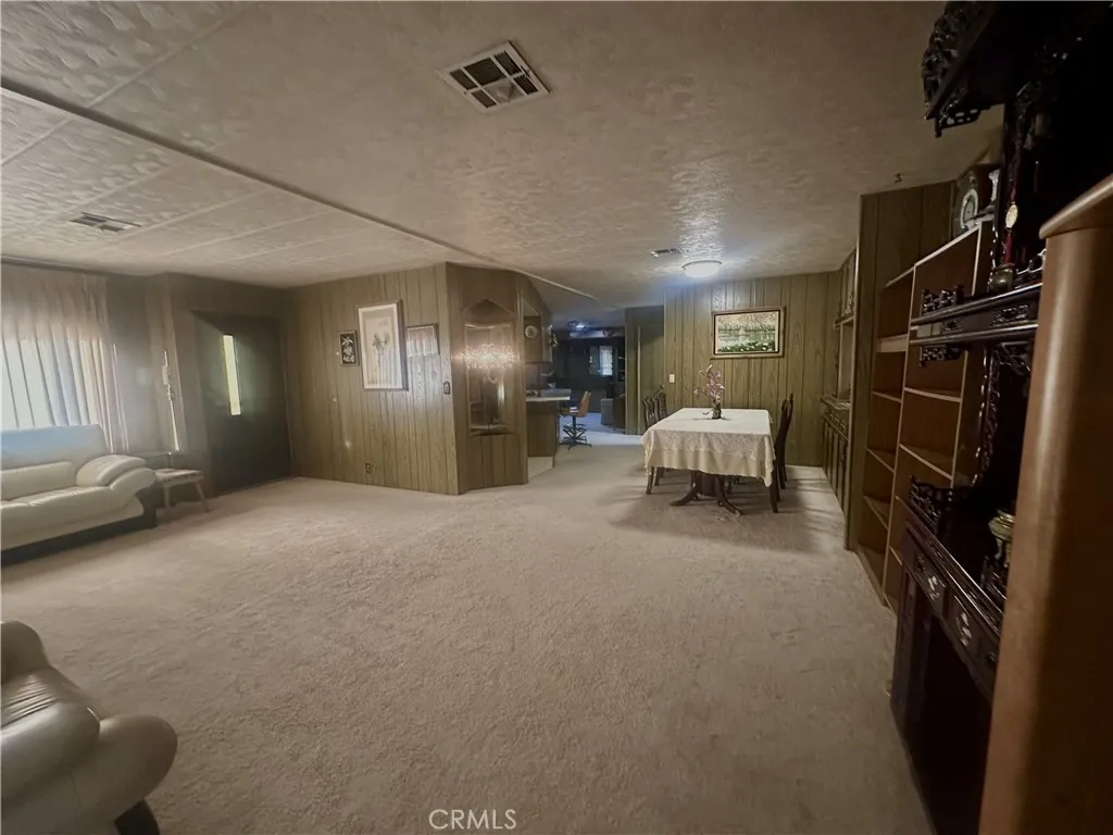 11250 Beach Stanton Ca, Unit 31 Stanton, CA 90680 - Photo 4 of 15 a view of hallway with furniture and storage