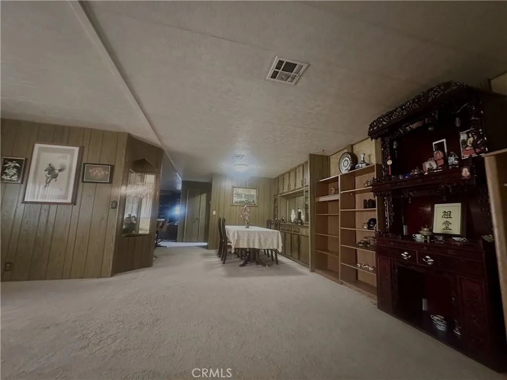 11250 Beach Stanton Ca, Unit 31 Stanton, CA 90680 - Photo 5 of 15 a living room with furniture and closet