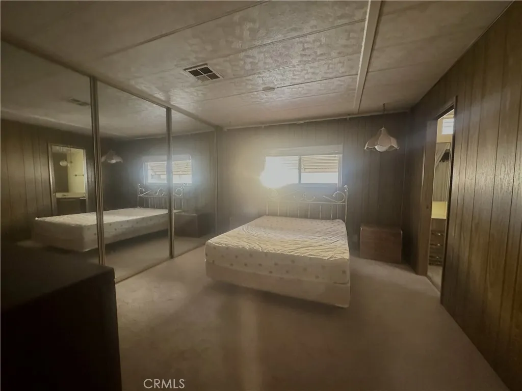 11250 Beach Stanton Ca, Unit 31 Stanton, CA 90680 - Photo 9 of 15 a en suite bathroom with a granite countertop sink