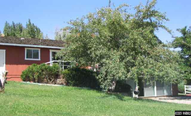 20920 Ames Lane Reno, NV 89521 - Photo 3 of 6 front view of a house with a yard