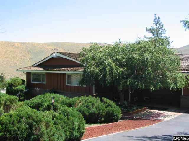 20920 Ames Lane Reno, NV 89521 - Photo 6 of 6 front view of a house with a yard