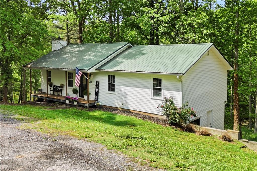612 Beaver Ridge Road Jasper, GA 30143 - Photo 2 of 38 a view of a house with garden and yard