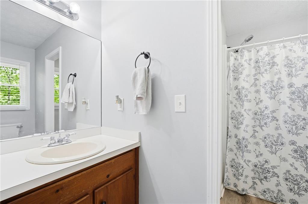 612 Beaver Ridge Road Jasper, GA 30143 - Photo 24 of 38 a bathroom with a sink and mirror