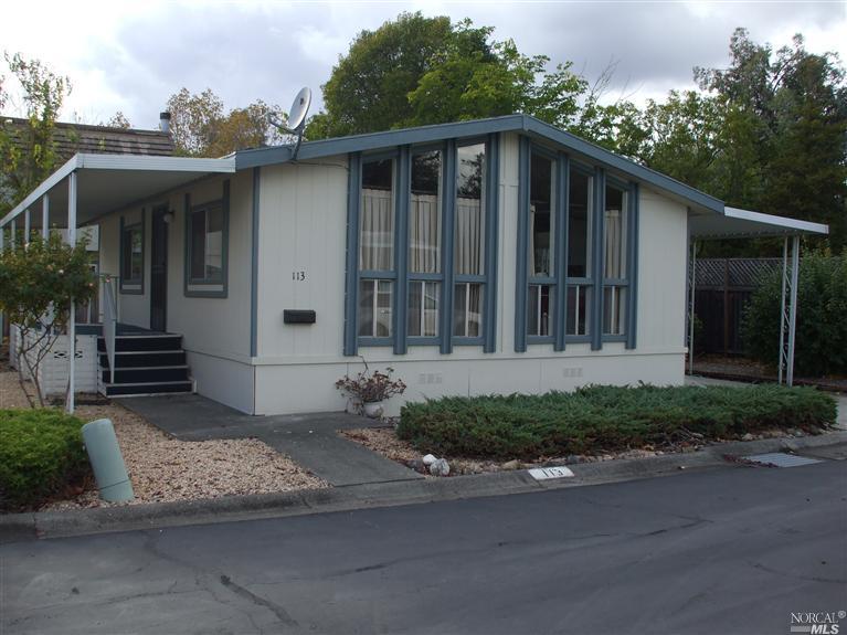 113 Cardinal Way, Unit 113 Santa Rosa, CA 95409 - Photo 1 of 1 a front view of a house with a garden