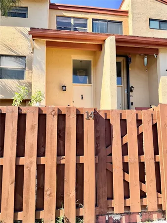 a front view of a house with a front door