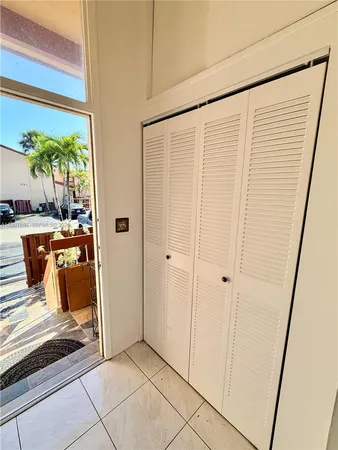 a kitchen with a sink and a stove top oven