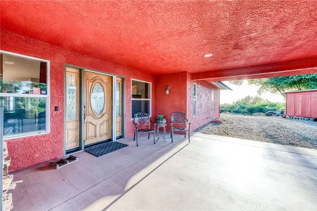 a bathroom with a sink toilet and mirror