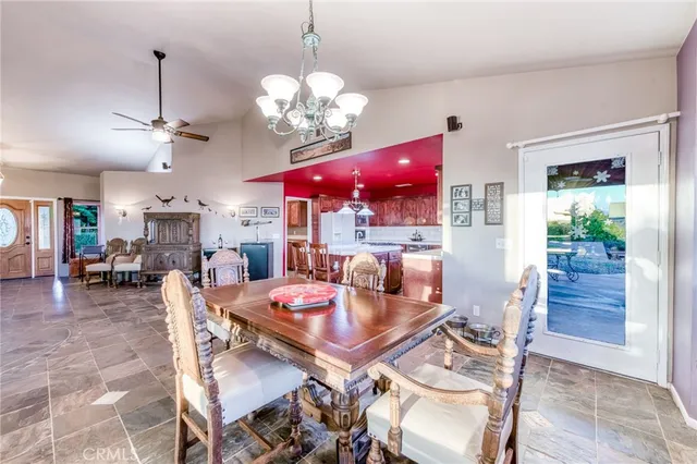 a patio with a table and chairs